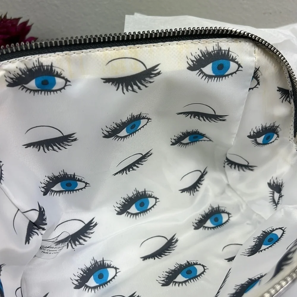 NWT Rodan + Fields Cosmetic Bag Silver with Tassel